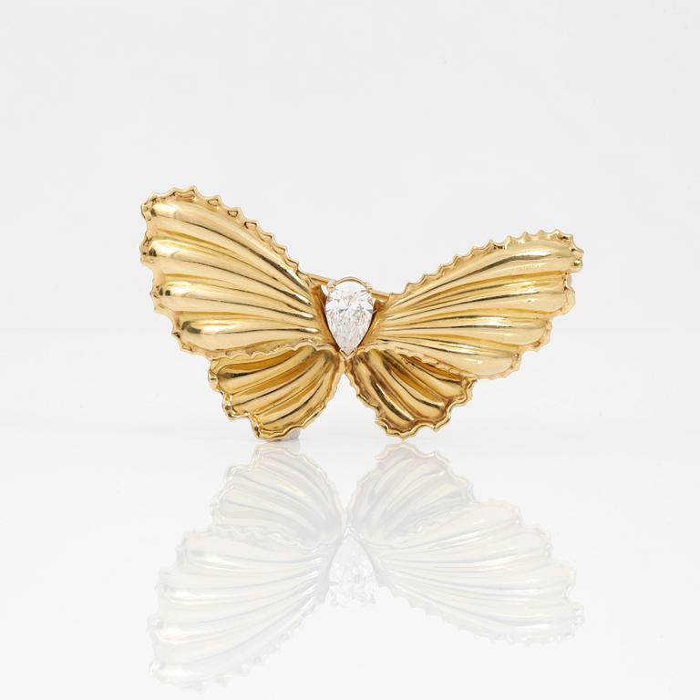 BROSCH, 18 k guld, med sten. Totalvikt ca 5 gram.