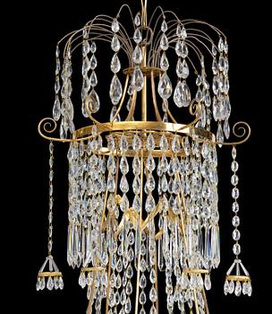 A late Gustavian gilt brass and cut glass seven-light chandelier, Stockholm, late 18th century.
