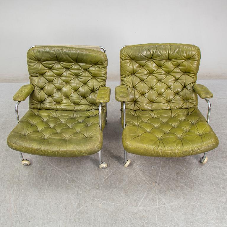 BRUNO MATHSSON, a pair of 'Karin' easy chairs, from DUX, second half of the 20th century.