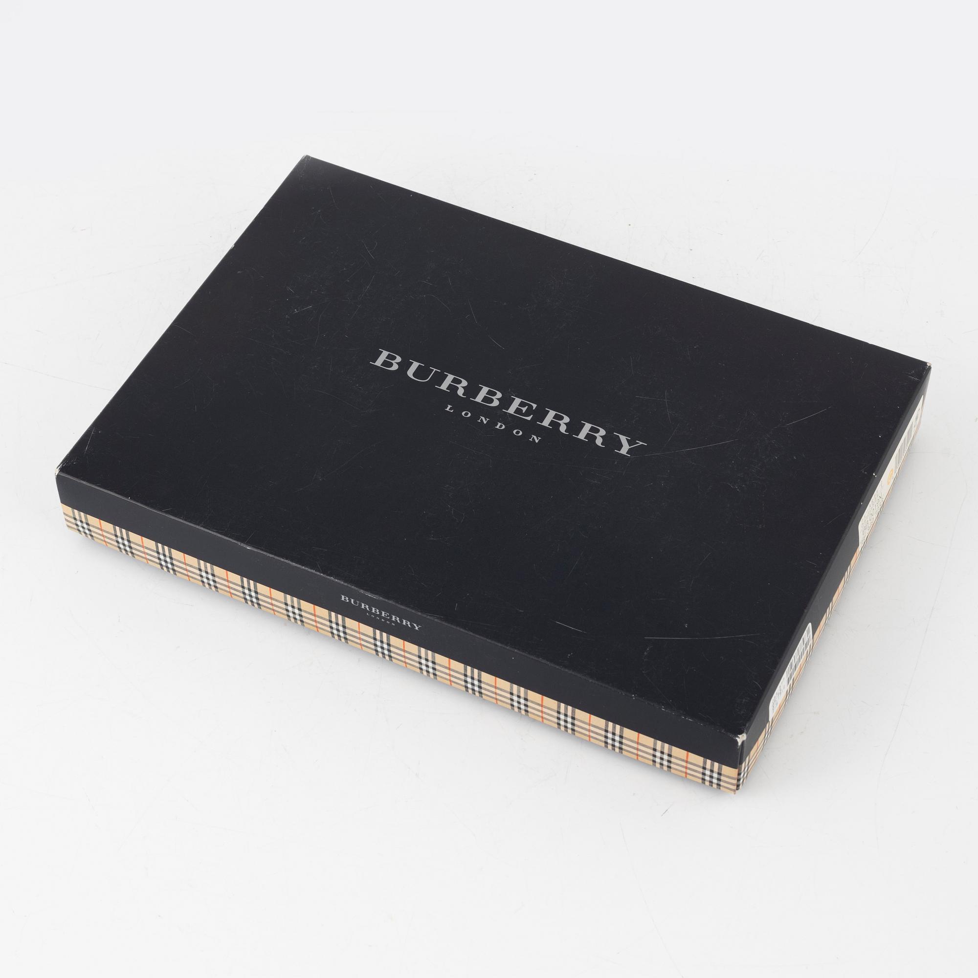 Burberry, a set of three towels.
