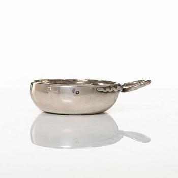 A French silver tastevin, mid-19th Century.