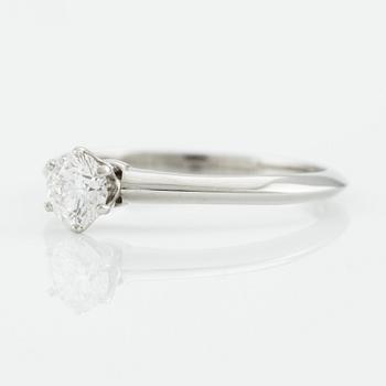 Tiffany & Co, platinum ring with a brilliant-cut diamond.