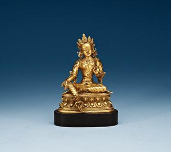 1296. A gilt bronze figure of Green Tara, Sino-Tibetan, 18th Century.