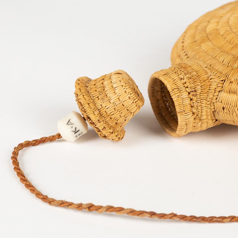 A birch root flask by Ellen Kitok-Andersson, signed.