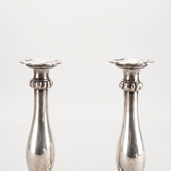 A pair of Austrian silver candle sticks Vienna 1852 weight 626 gr.