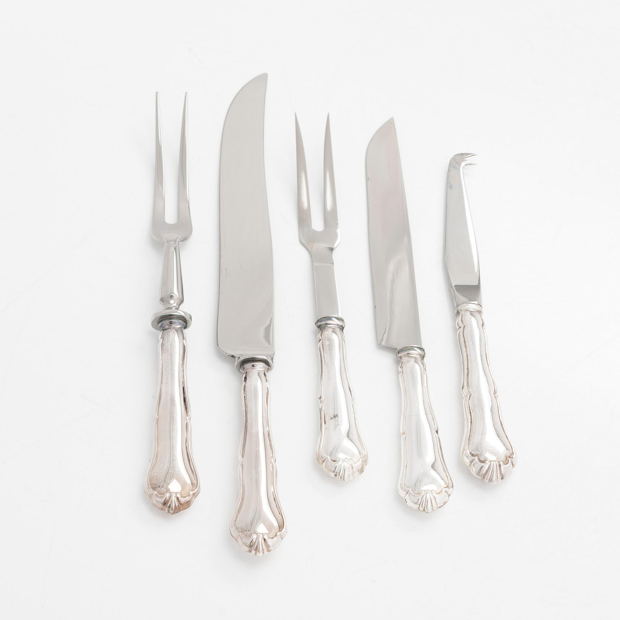 A 78-piece silver 'Chippendale' cutlery set, 1978-2007. Various Finnish manufacturers.