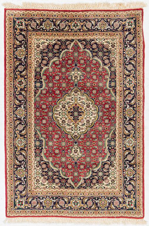 Rug, probably Tabriz, approx. 145 x 95 cm.