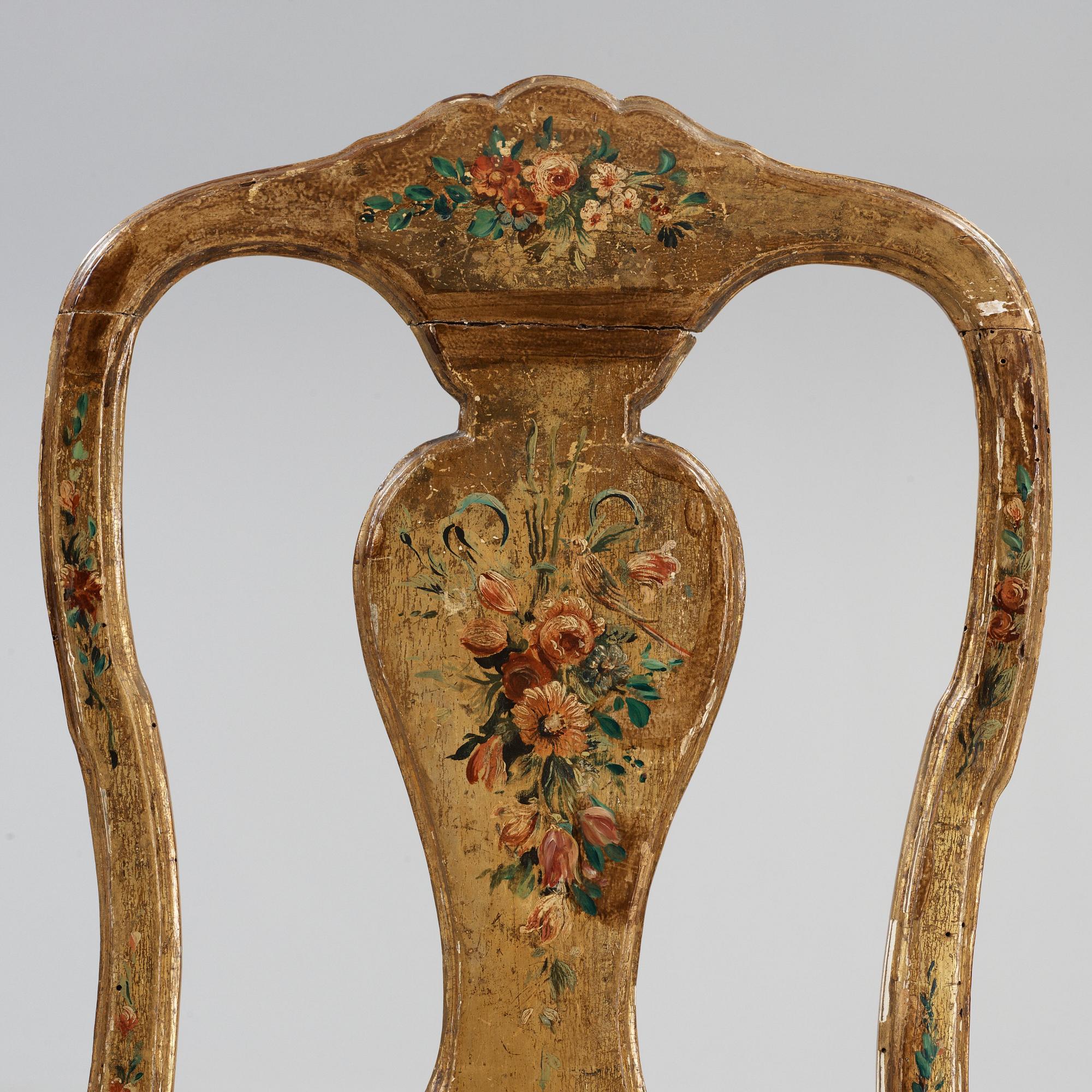 A pair of Italien Rococo 18th century chairs.