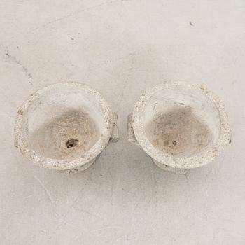 A pair of concrete garden urns 20th century.