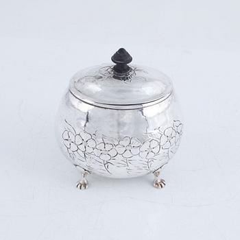 A silver sugar box, early 20th Century.