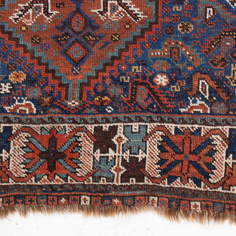 An antique Kamseh rug, c. 150 x 118 cm.