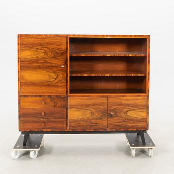 Display cabinet, 1940s.