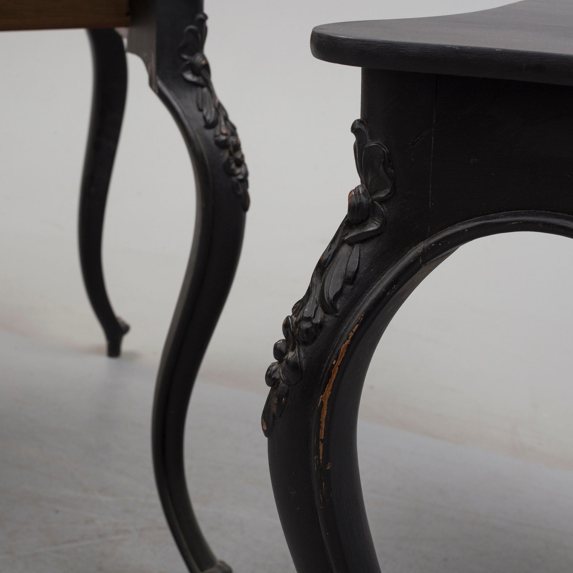 A pair of end of the 19th century new rococo style painted card tables.