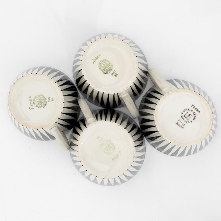 A set of four teacups with saucers  by Eugen Trost for Gefle.