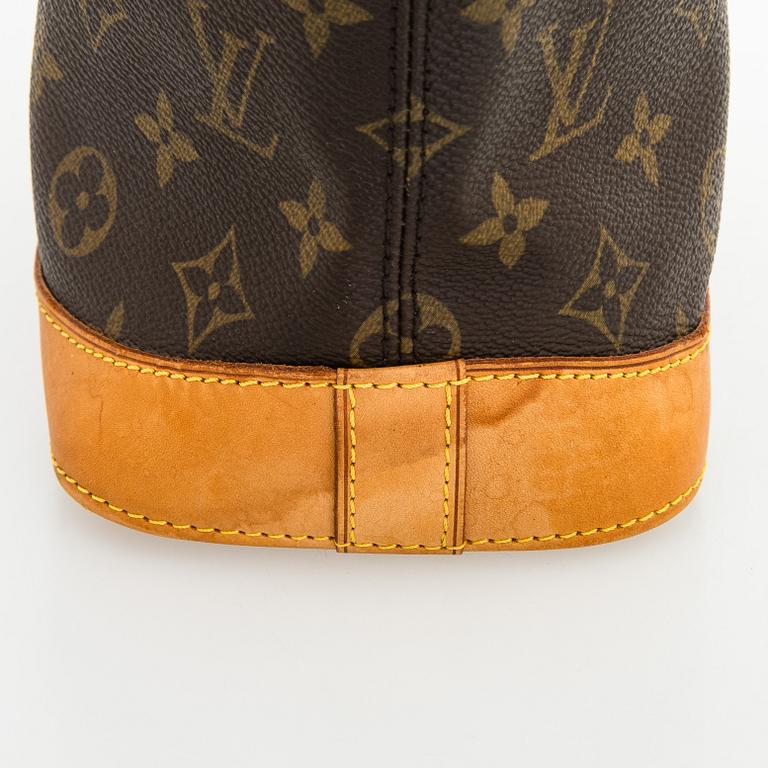 Louis Vuitton, a 'Lockit PM' bag.