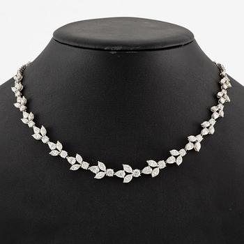 A platinum necklace set with navette-, pear- and round-brilliant-cut diamonds.