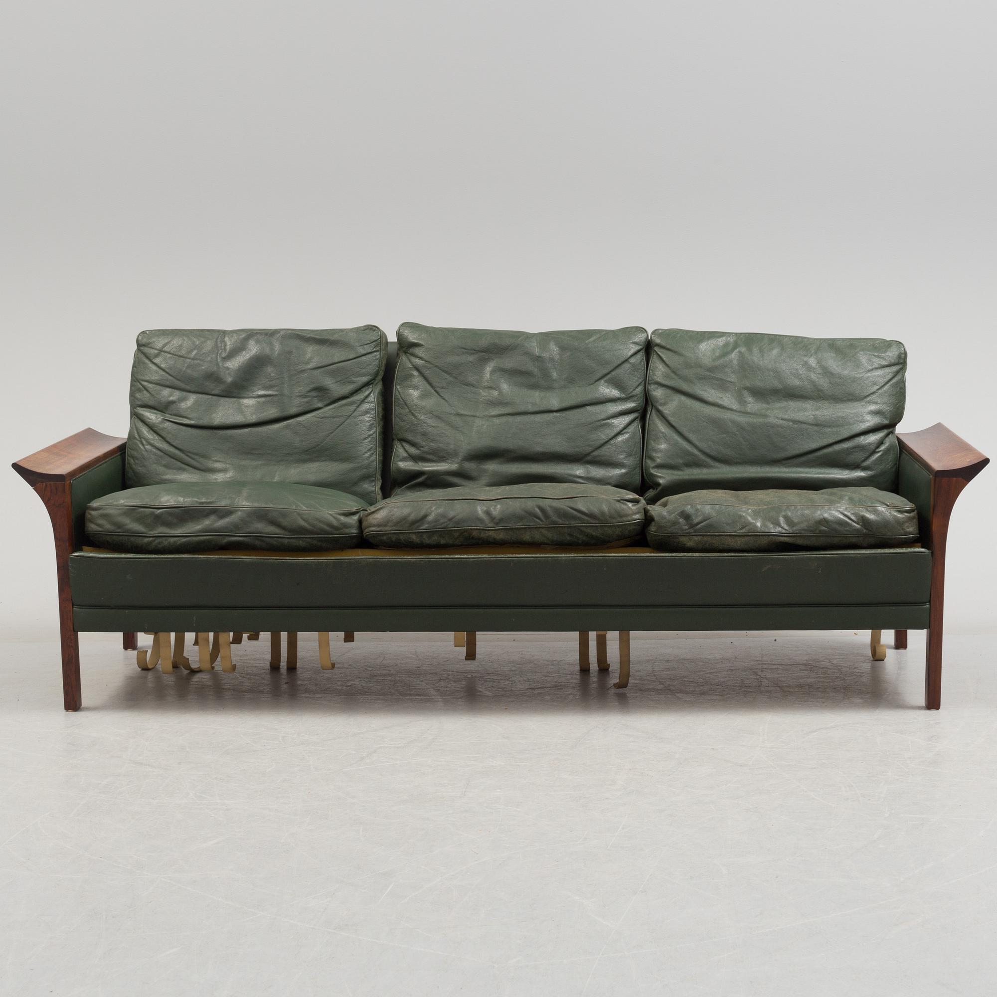 A 1960's Danish sofa, with 2 easy chairs and 2 tables by Glostrup.