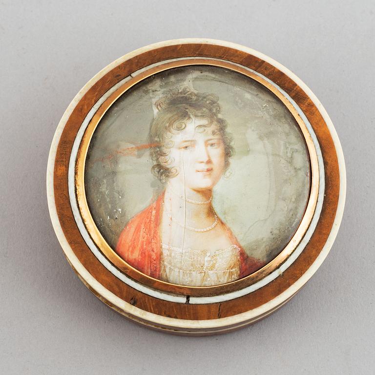 A birch box with bone inlay, in the lid a miniature portrait of a lady, signed D. Bossi.