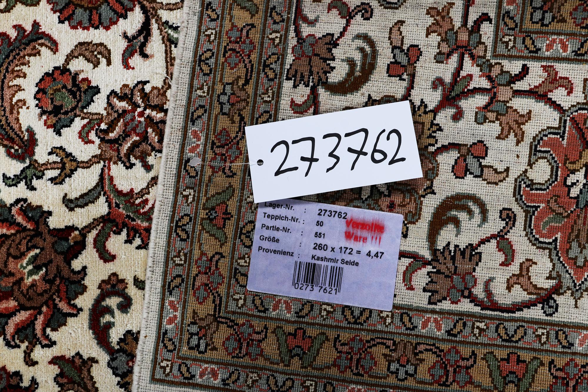 A carpet, silk Kashmir, ca 260 x 172 cm.