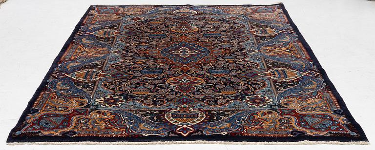 A Kashmar carpet, c. 295 x 198 cm.