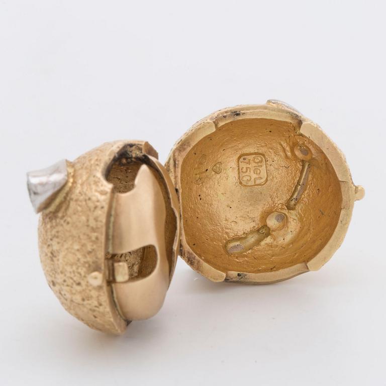 LYNGGAARD lås 18K guld och vitguld m 2 briljanter ca 0,10 ct totalt.