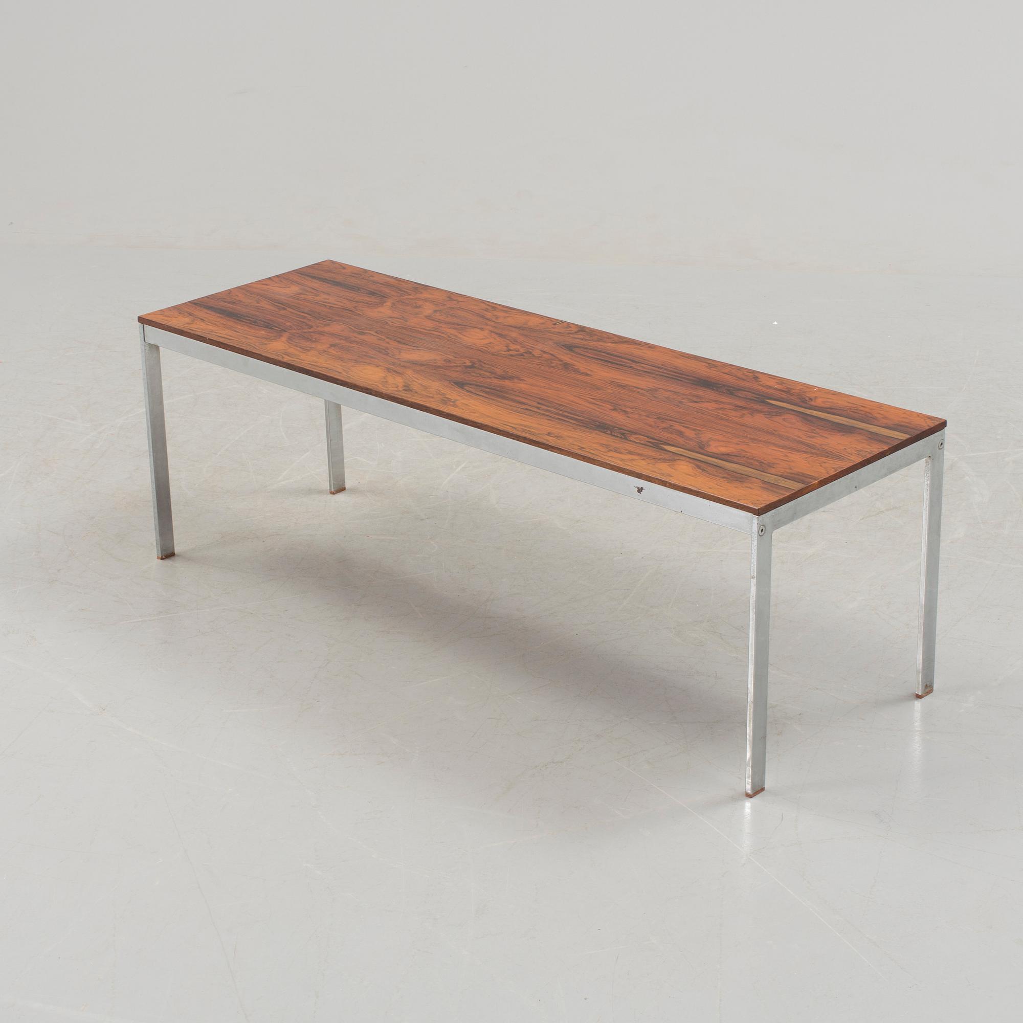 A 1960's/70's rose wood veneered coffee table by Gillis Lundgren for IKEA.
