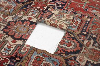 An Antique Heriz carpet, north west persia, c. 420 x 210 cm.