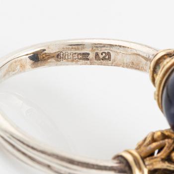 An Ilias Lalaounis ring in silver and 18K gold with sodalite.
