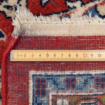A Sarouk carpet, c. 330 x 215 cm.