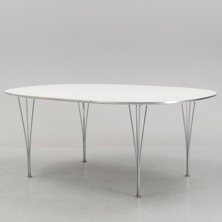 A 'Super elliptical' dining table by Bruno Mathsson & Piet Hein for Fritz Hansen, dated 1995.