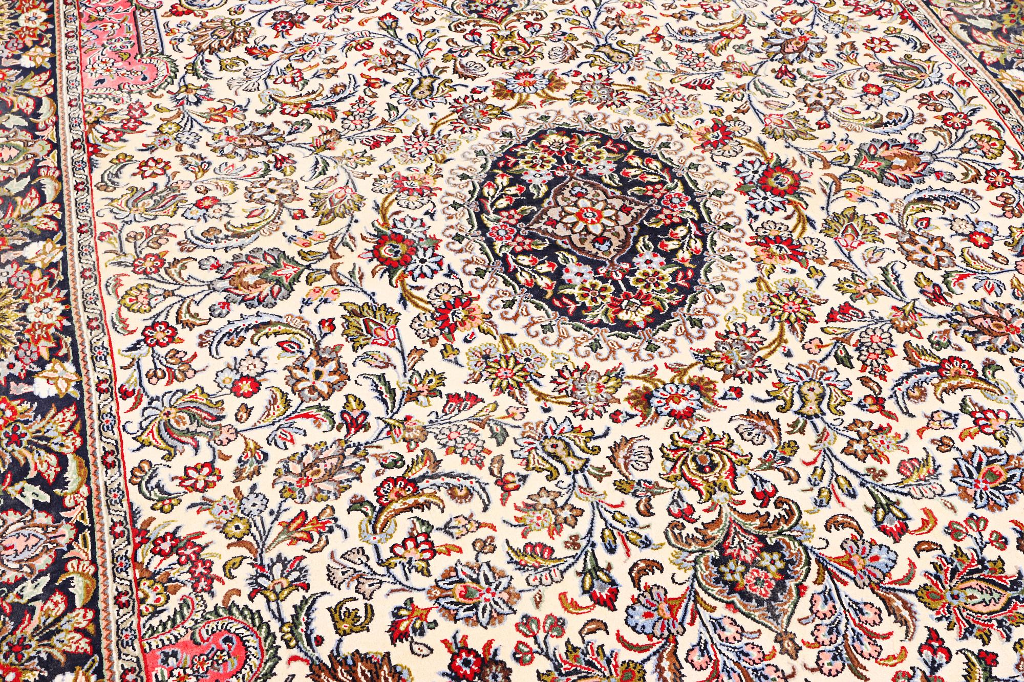 A Quum rug, c. 204 x 134 cm.