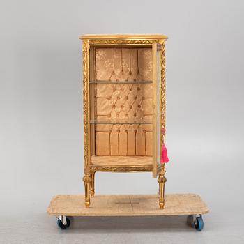 A Louis XVI-style display cabinet, second half of the 20th Century.