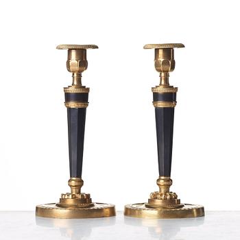 A pair of French Directoire candlesticks, circa 1800.