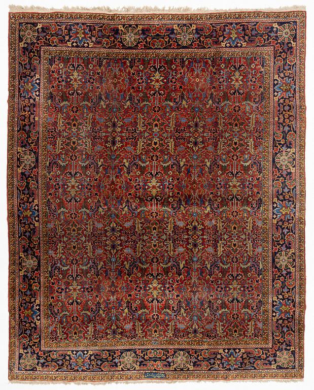 A semiantique carpet, noth western Persia, presumably Heriz, ca 381 x 308 cm.