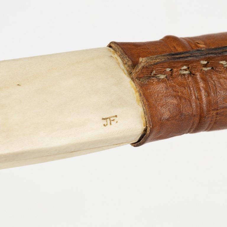 Johan Fankki, a reindeerhorn and leather knife, Kaitum, signed JF.