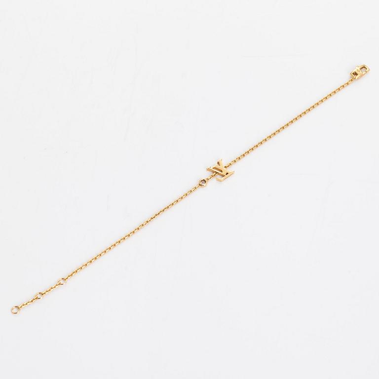 Louis Vuitton, an 18K gold 'Idylle Blossom LV' bracelet with a diamond.