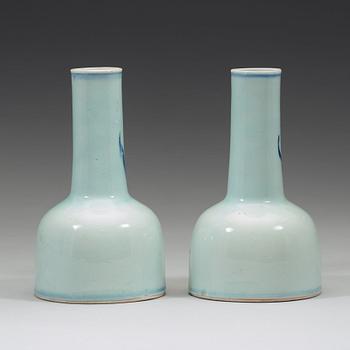 A pair of blue and white porcelain mallet form vases, Qing dynasty, 19th century.