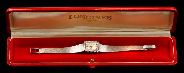 ARMBANDSUR, 18k vitguld med briljantslipade diamanter ca 0,60 ct. "Longines", cikt tot ca 42 g.