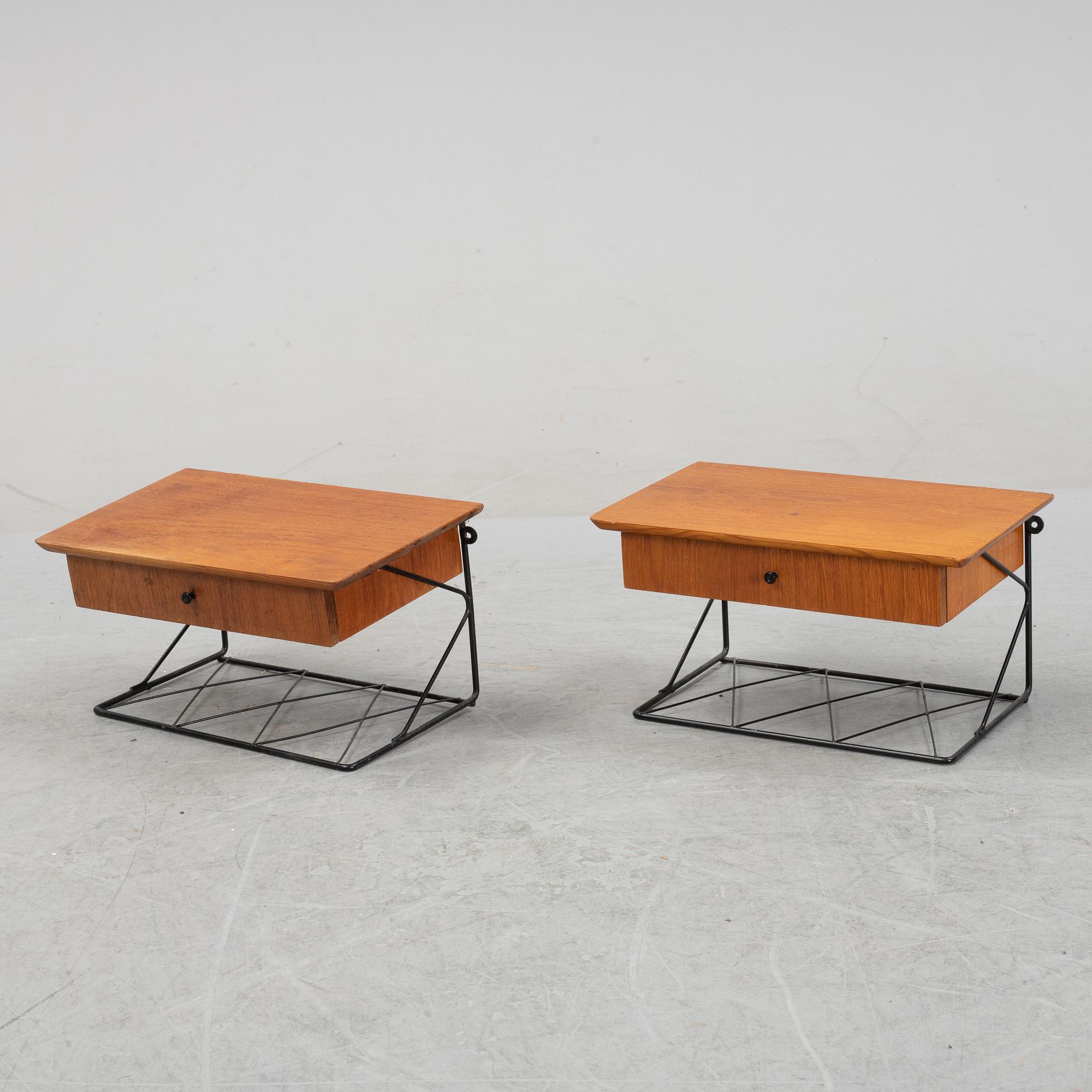 A pair of teak bedside tables, 1950's.