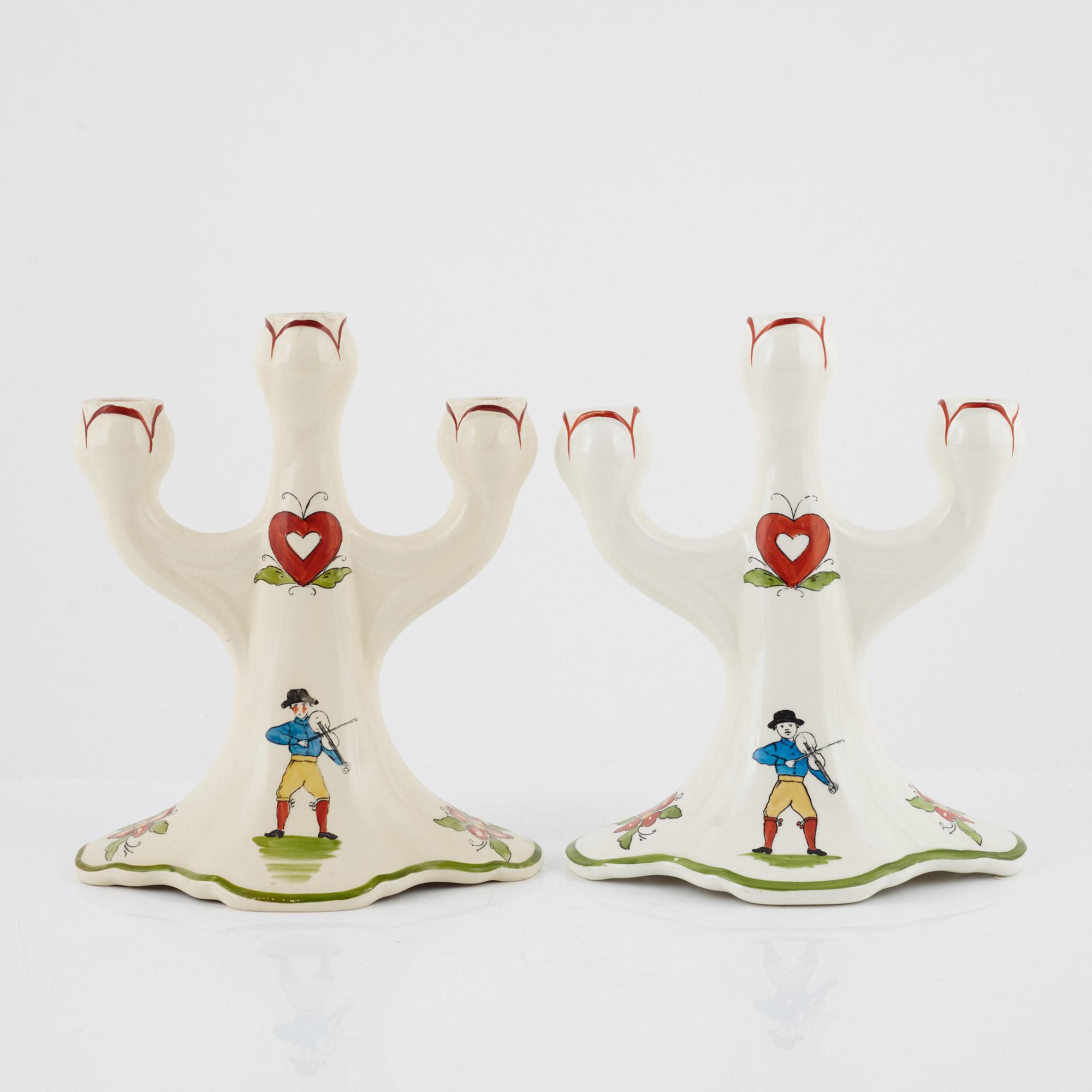 A pair of 'Daladansen' creamware candelabra from Rörstrand, Art Nouveau, early 20th Century.