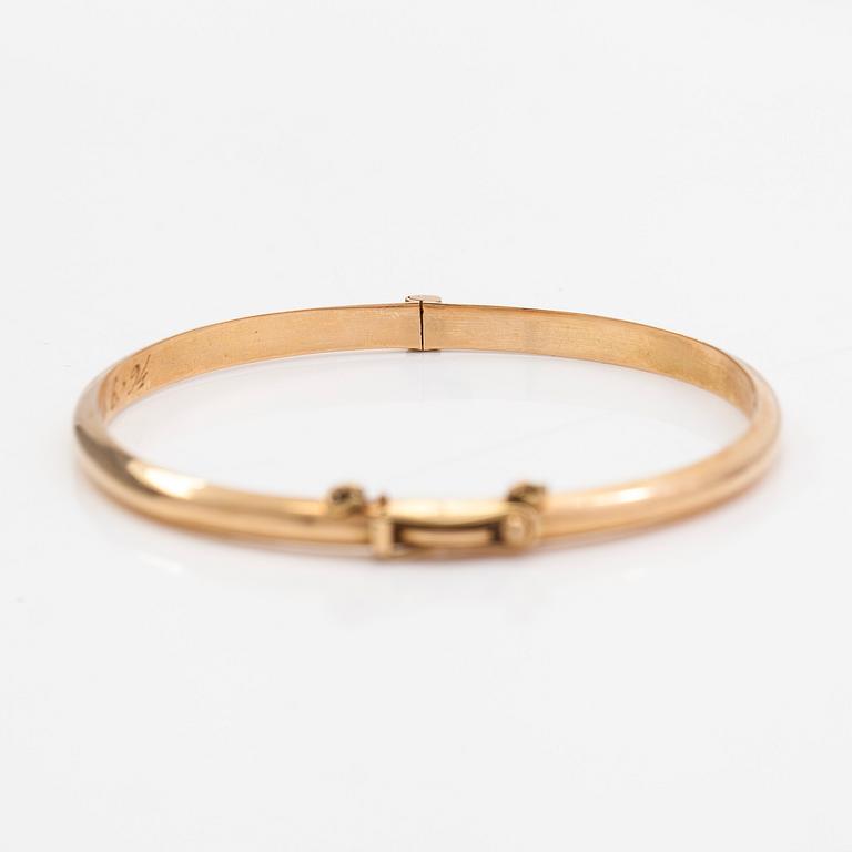 Armring, 14K guld, Ky Kari Rosti, Helsingfors 1994.