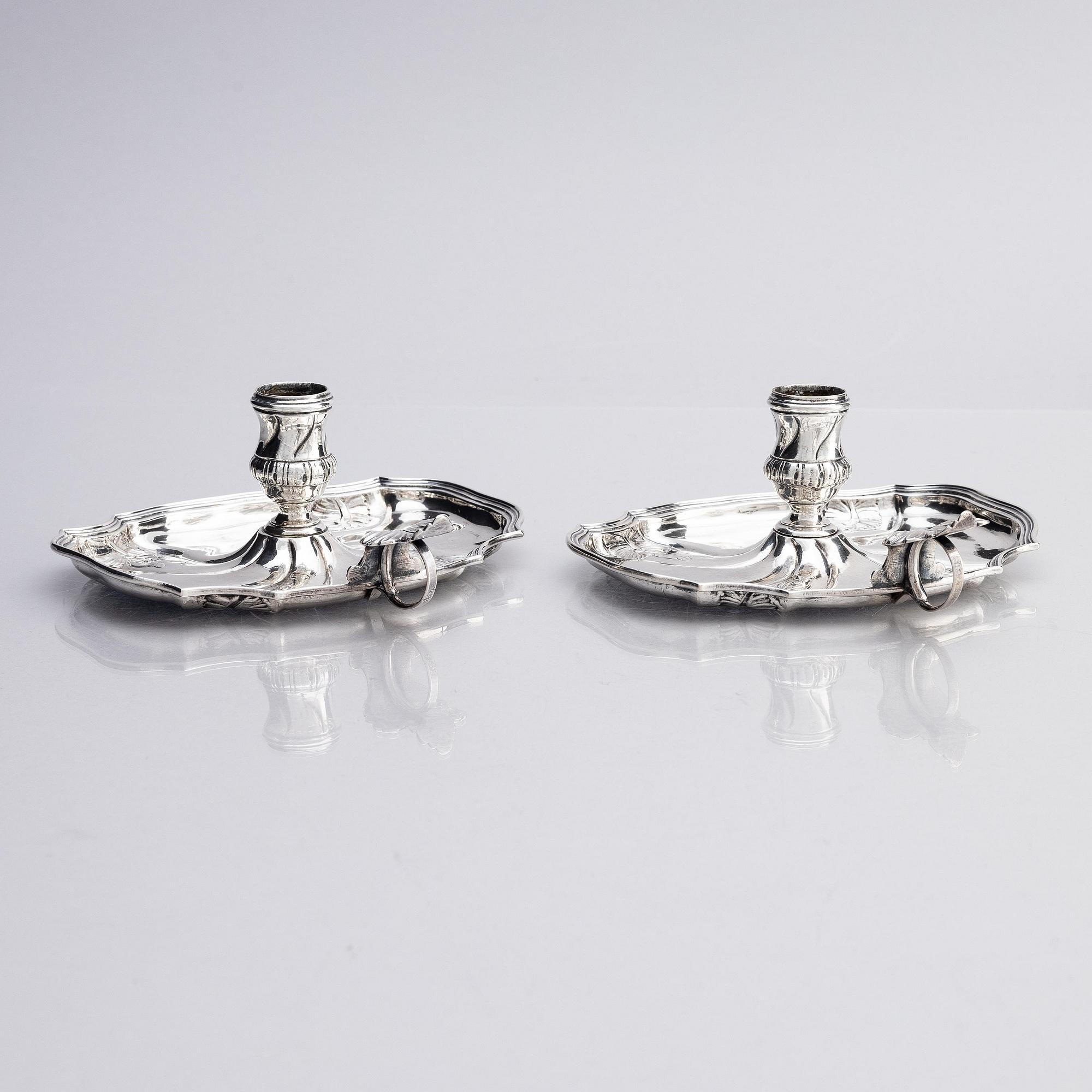 A pair of Swedish 18th century silver chamber-candlesticks, marks of Olof Gravander, Kristinehamn 1761.