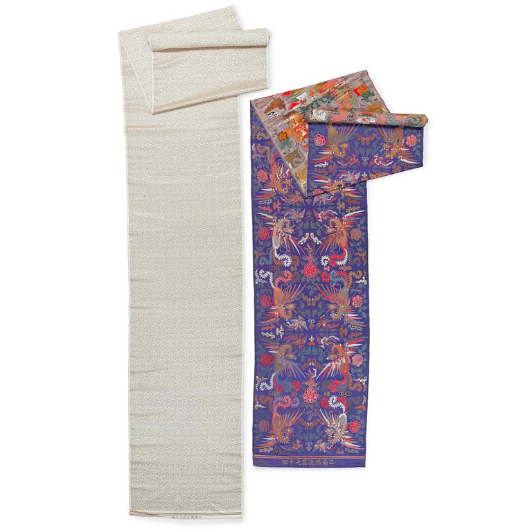 FABRIC ROLLS, 2 pieces, silk. Two uncut rolls of silk yardage. 777 x 71 and 702 x 72 cm. China late Qing dynasty.
