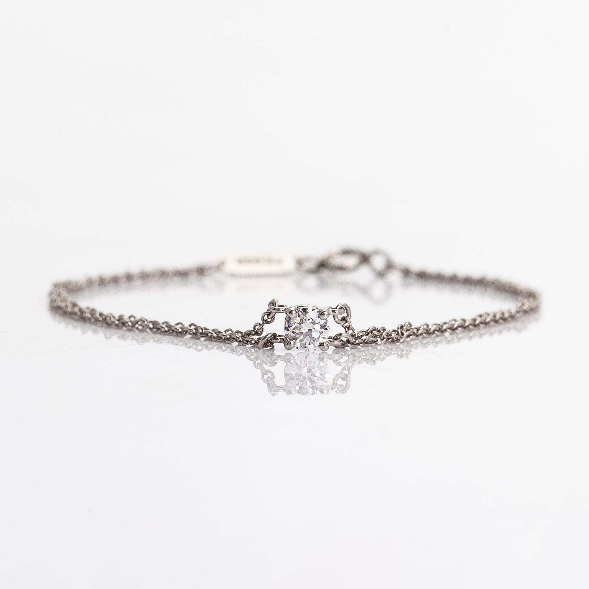 Tiffany & Co, rannekoru, platinaa ja briljanttihiottu timantti.