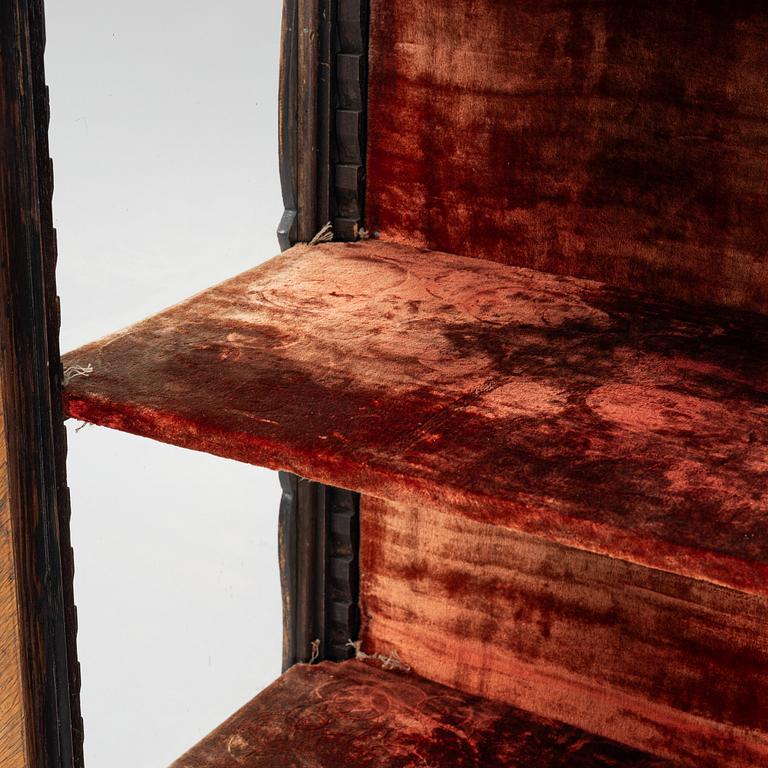 A 19th century, Rococo style display cabinet.