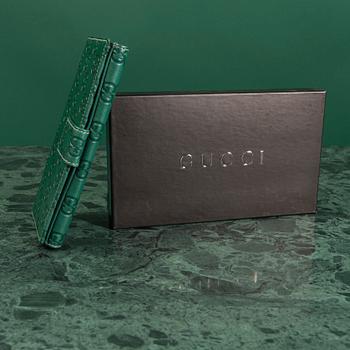 PLÅNBOK, Gucci.