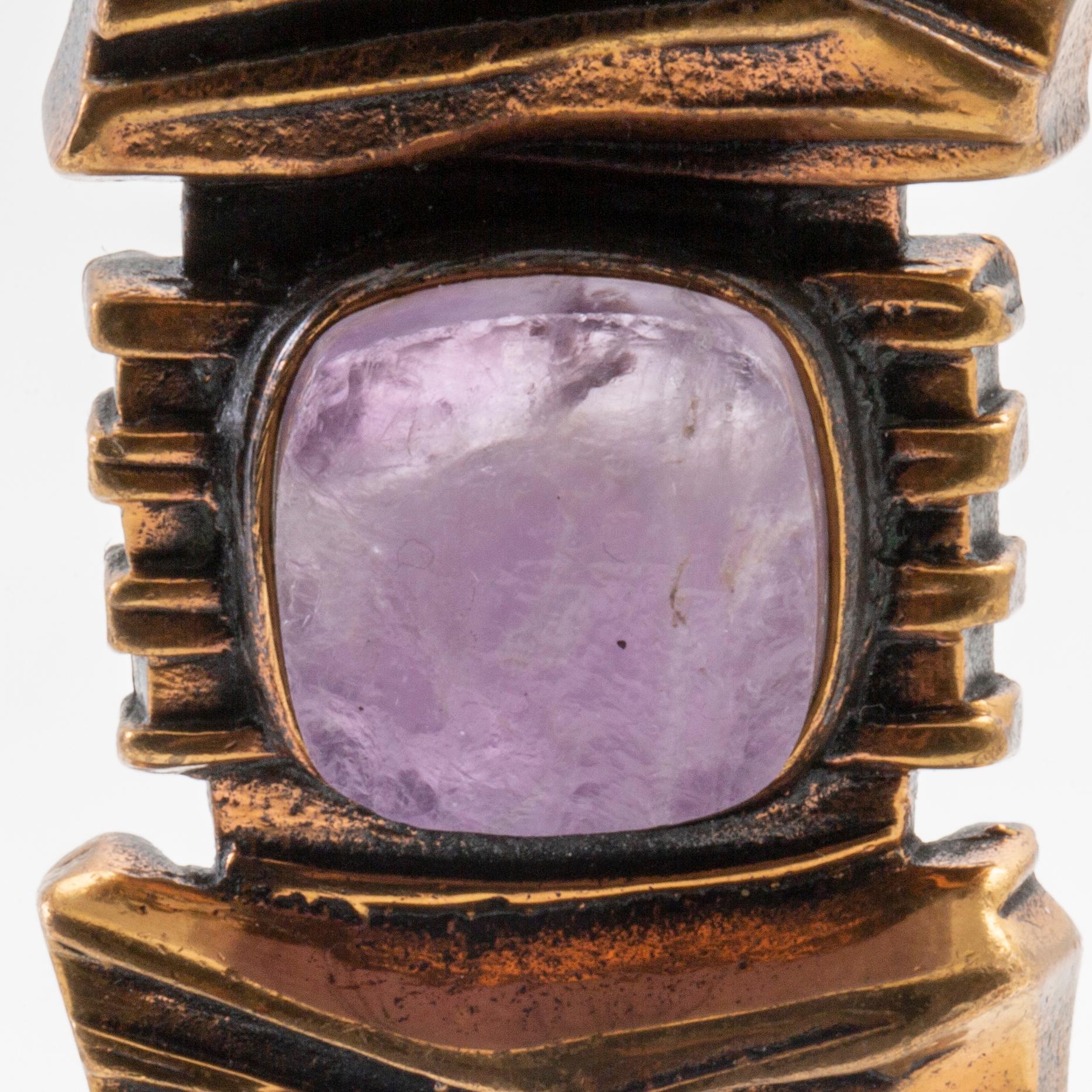 A bronze necklace set with an amethyst by Pentti Sarpaneva.