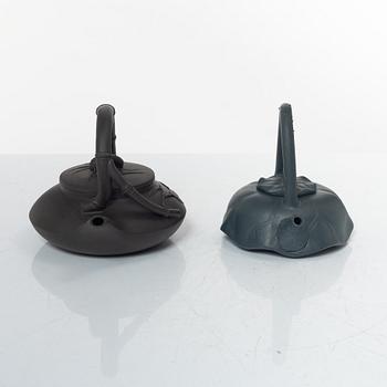 Two Chinese yixing ware teapots, 20th century.