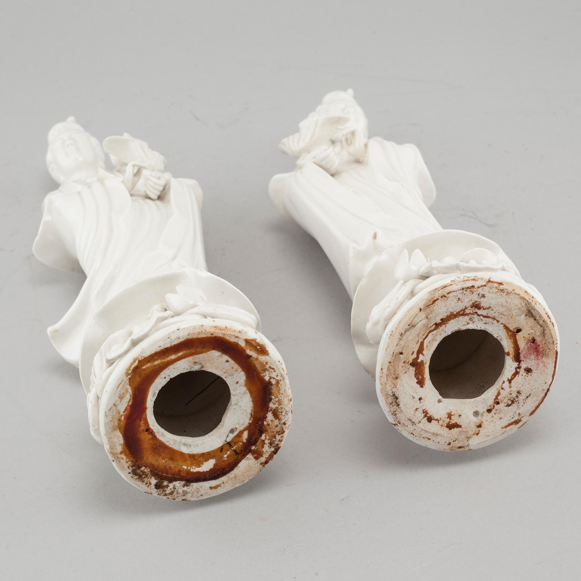 A pair of Chinese blanc de chine figurines, circa 1900.