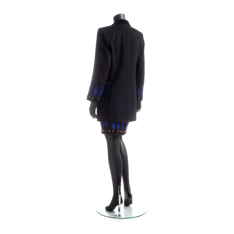 LOUIS FÉRAUD, a two-piece black wool suit consisting of jacket and skirt.